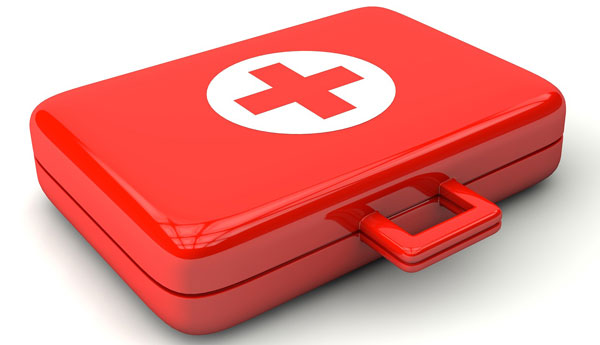 Red first aid kit with cross