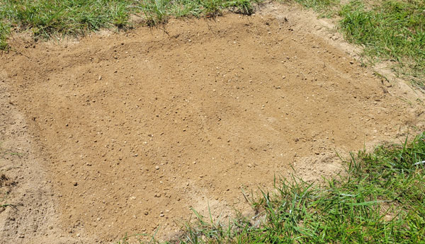 Tilled dirt patch with zeolite on top