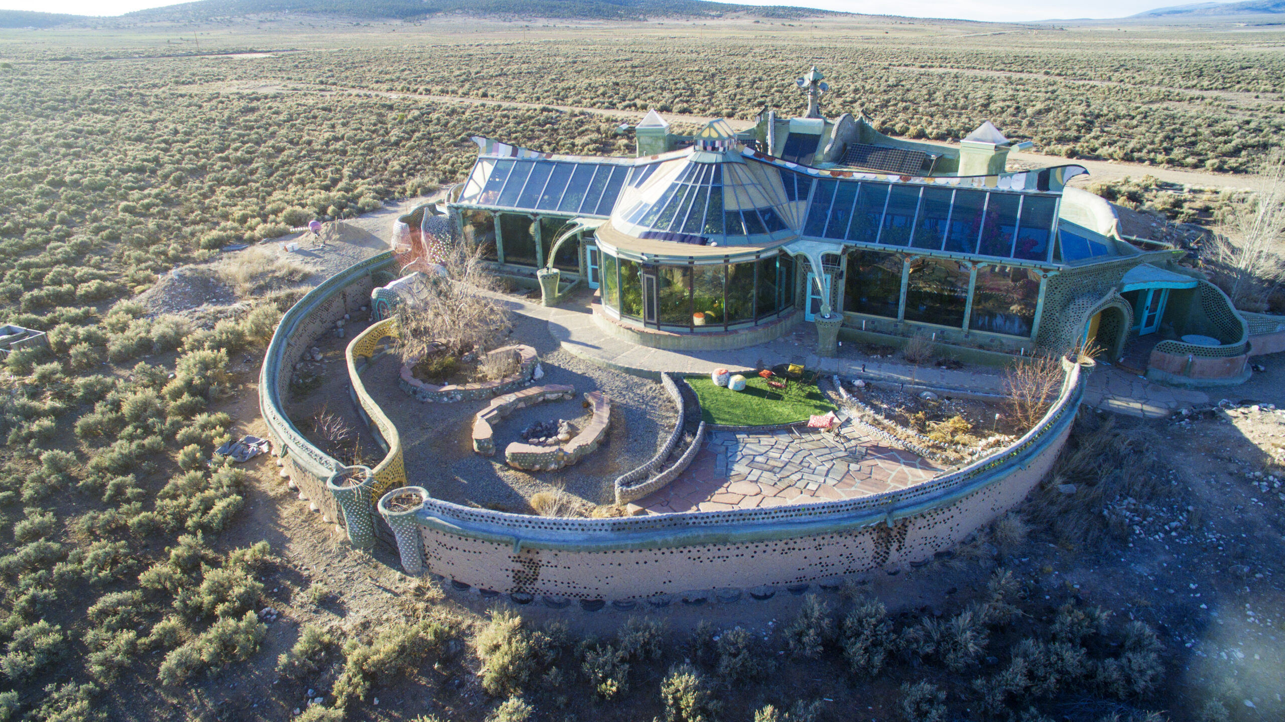 Earthships_Taos_3_17_dm_aerial_9_df729359-23f8-40a8-ab27-67d210cced8f - Current Homesteading Earthships Taos 3 17 dm aerial 9 23f8 40a8 ab27