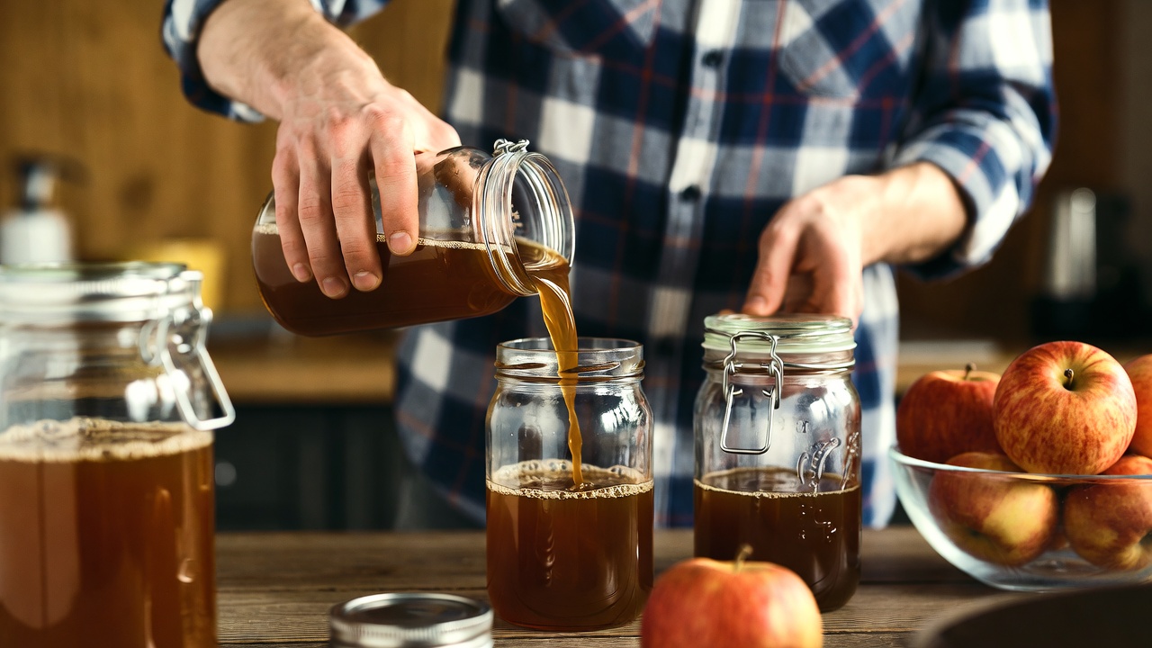 Preserving apple cider - Current Homesteading Jars of homemade apple cider for storage